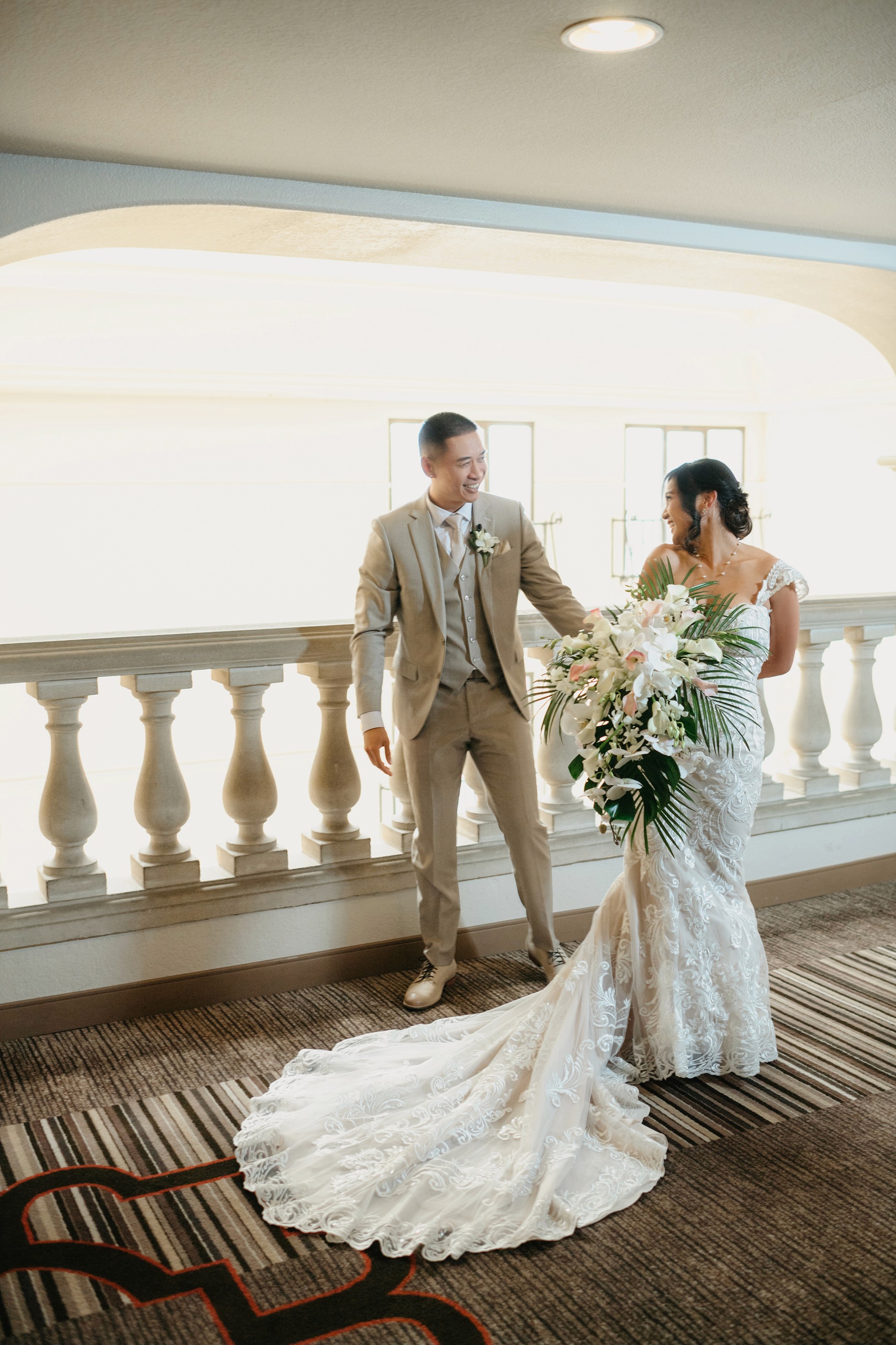 Flat lay wedding details with bouquet, rings, and sparkling bridal heels