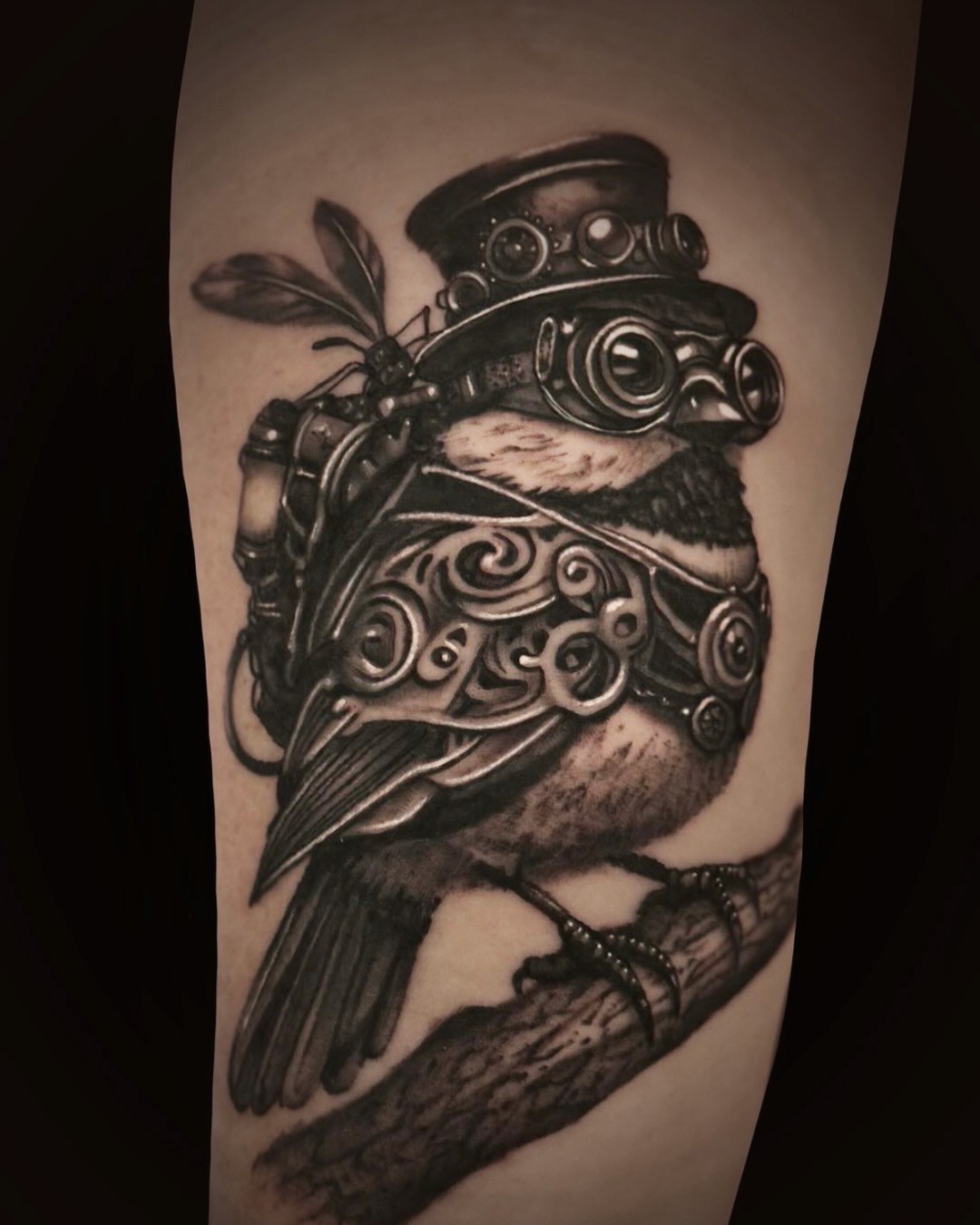 realistic black and gray tattoo of a steam punk bird by Jen bean