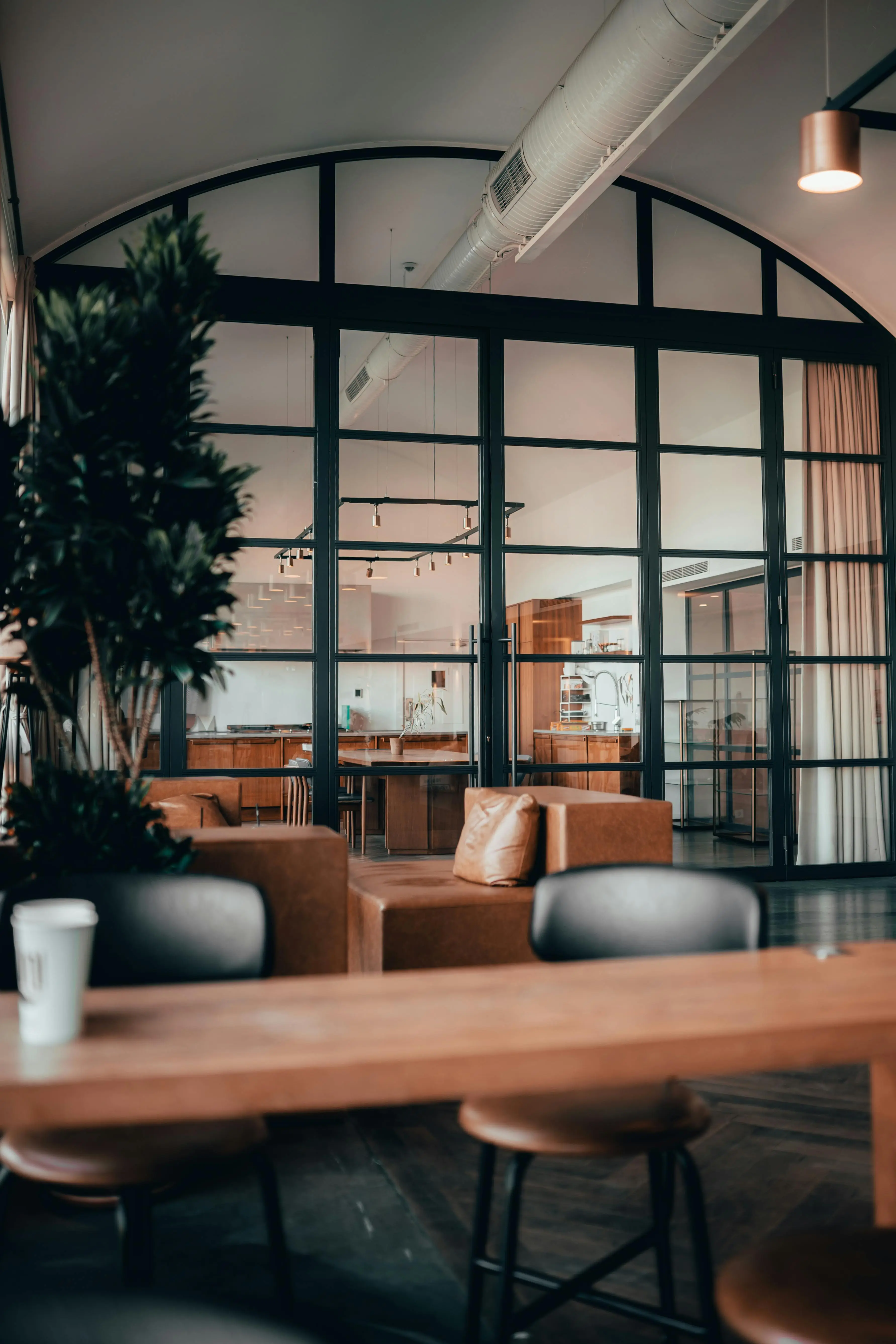 a room filled with furniture and a large window