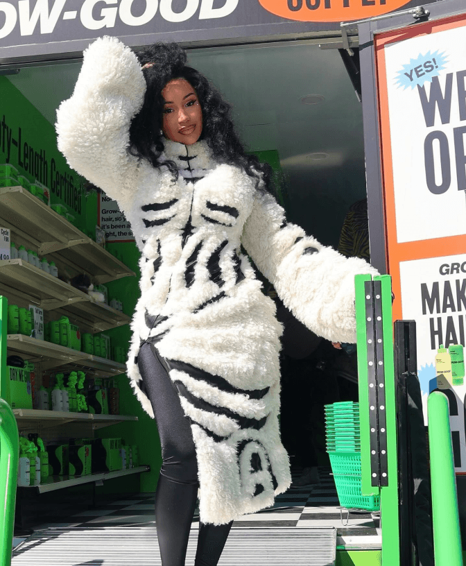 Grow-Good Beauty tour activation — Cardi B beauty bus at live events, product display, fan engagement