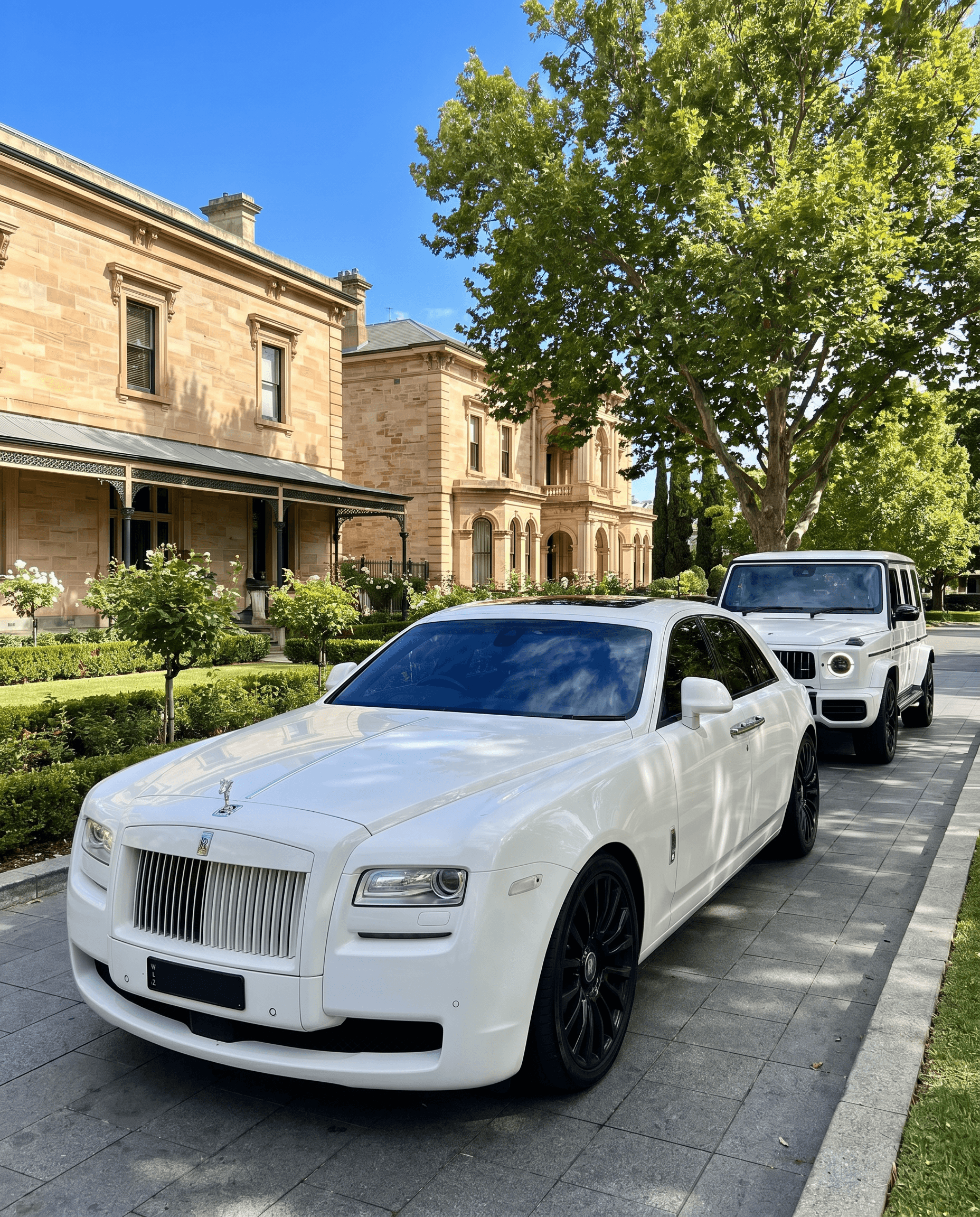 Luxury car passing a vineyard estate near Adelaide