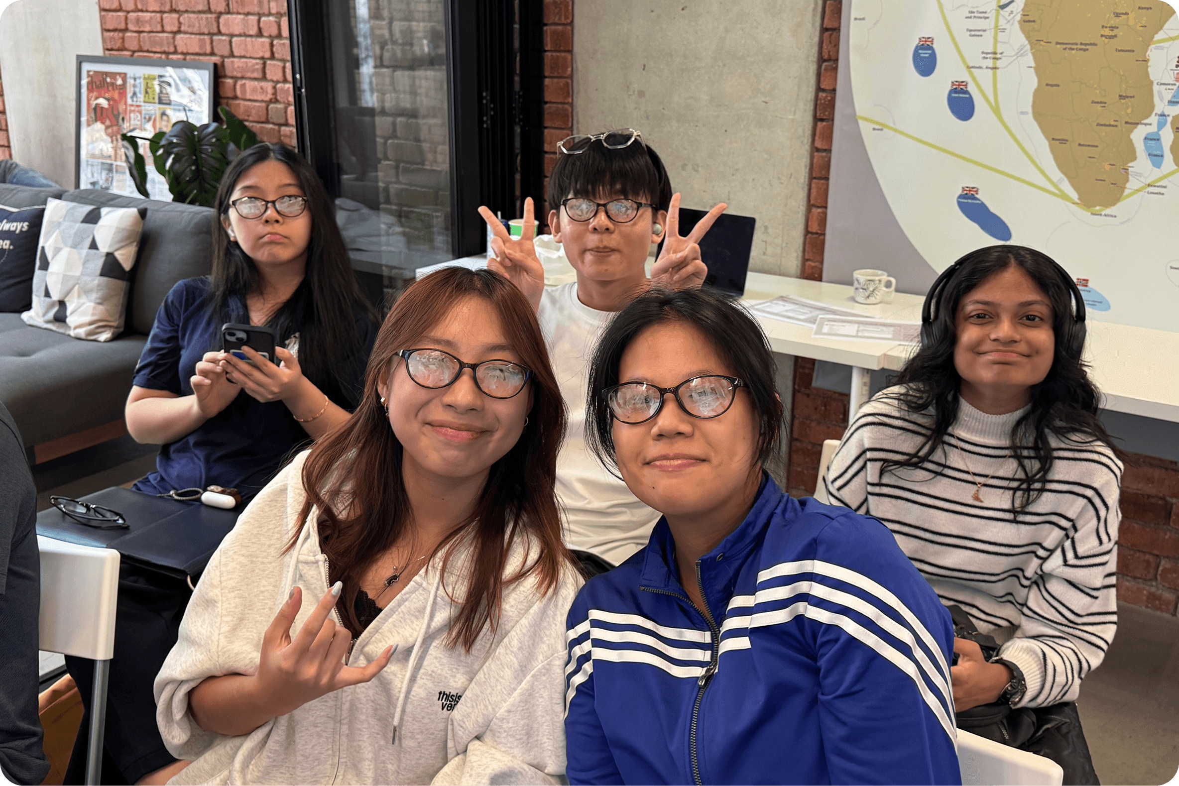 A candid group photo of 5 students