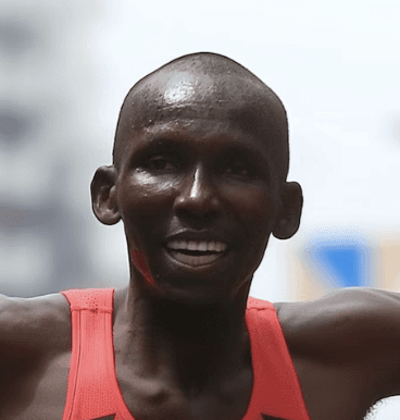 Happy marathon runner after race