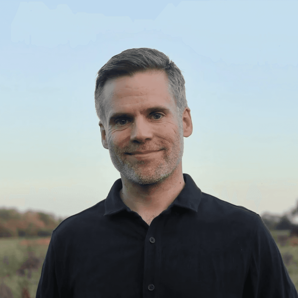 Photo of Tom in a field