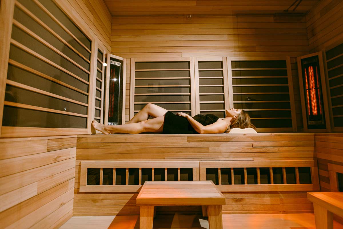 Woman laying in Sauna