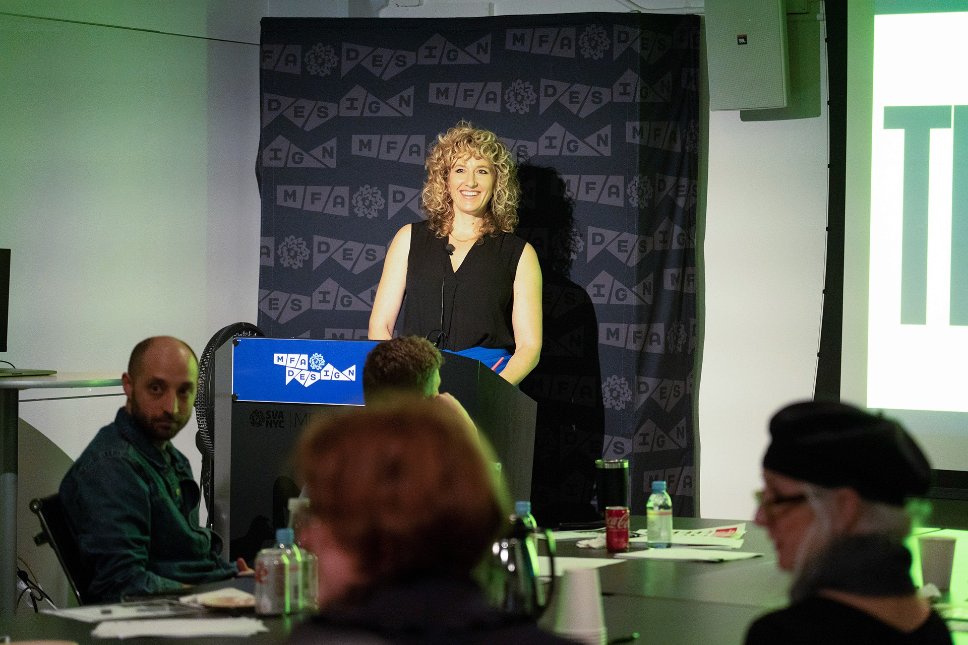 a student giving a presentation from a podium