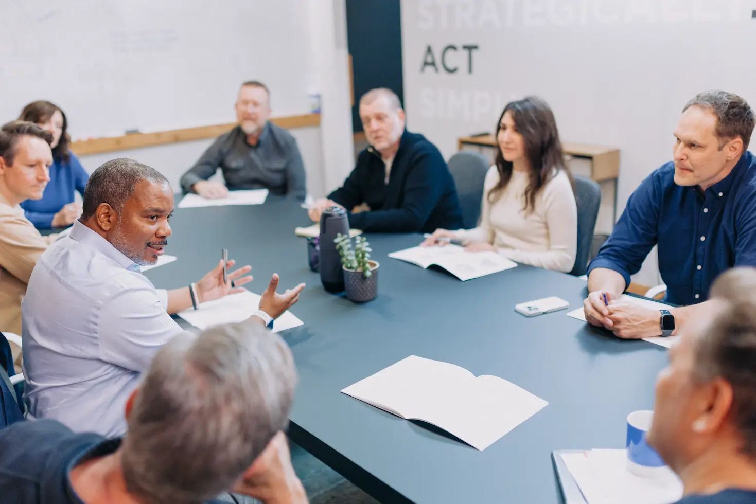 Sherpas guiding climbers up a mountain