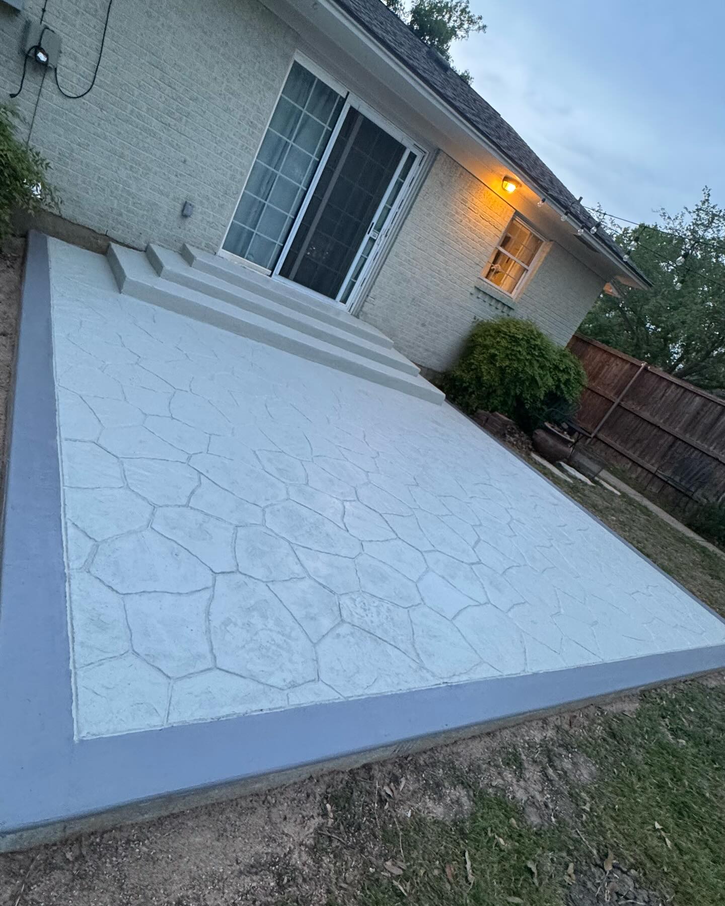 A man riding a skateboard down a flight of stairs