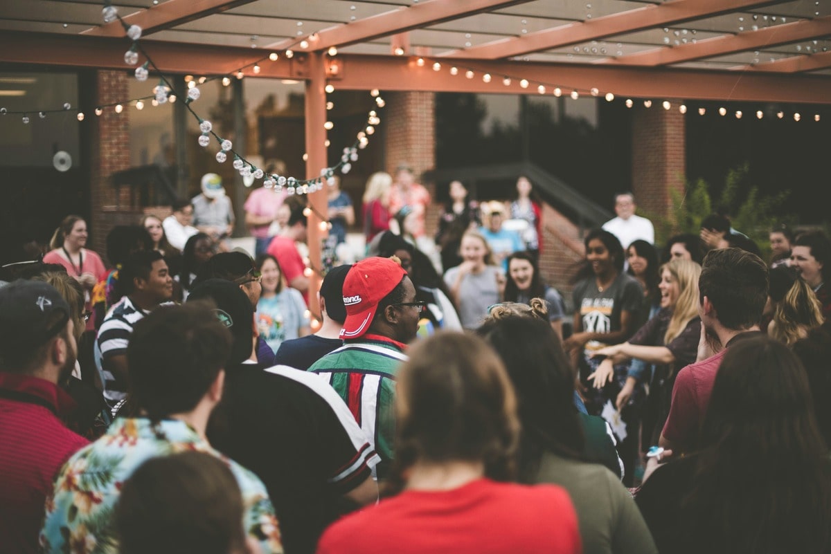 Group of people coming together to connect and have a good time.