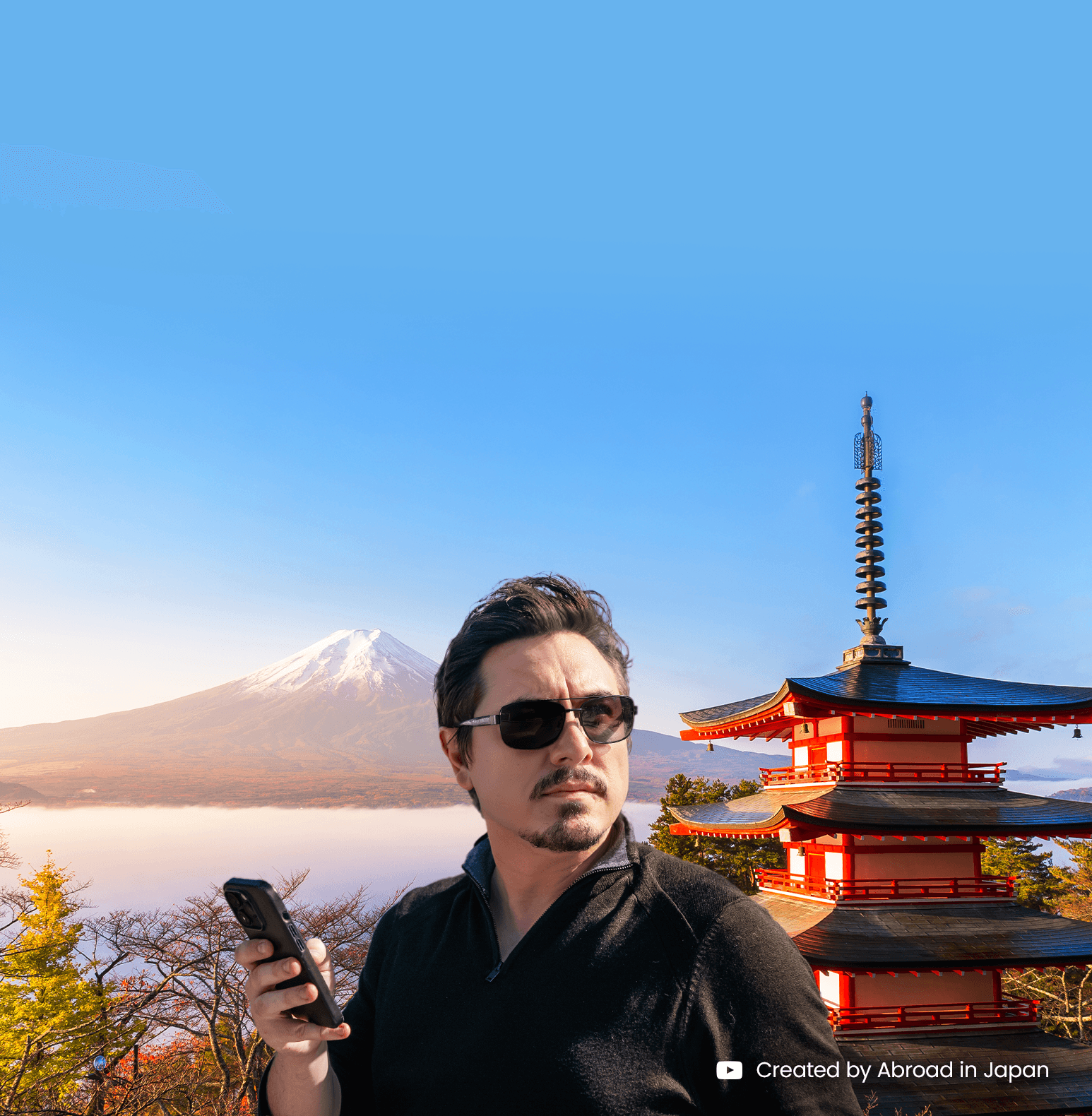 Chris Broad using his phone with eSIM active near Mount Fuji, symbolizing reliable eSIM connectivity for travelers in Japan.