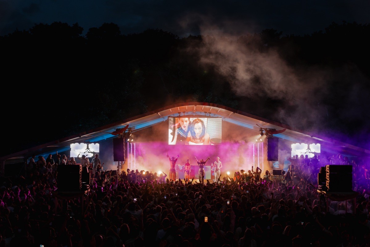 Drone shot of a running track at night