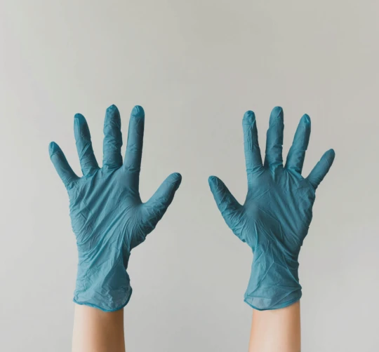 persons left hand with white background