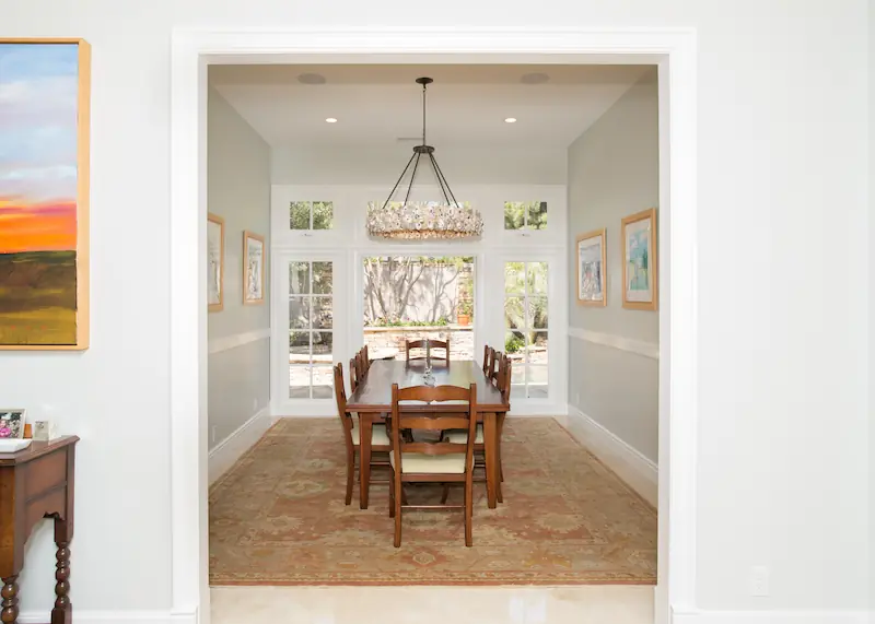 Dining room seating seen through the entryway from the Big Canyon Remodel project. Photo by Chris Darnall.