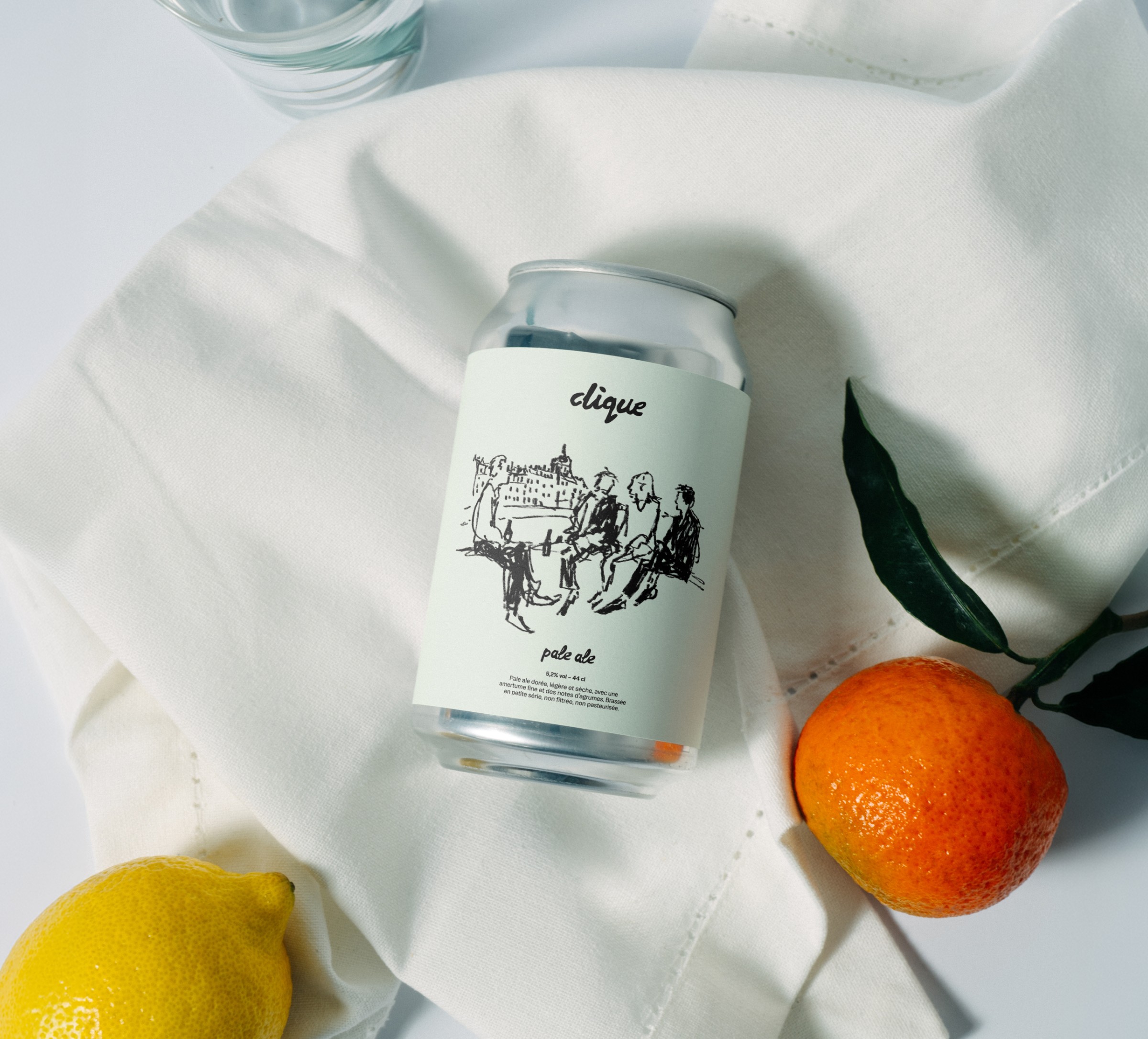 Stack of modern books and magazine with minimalist cover design on leather chair