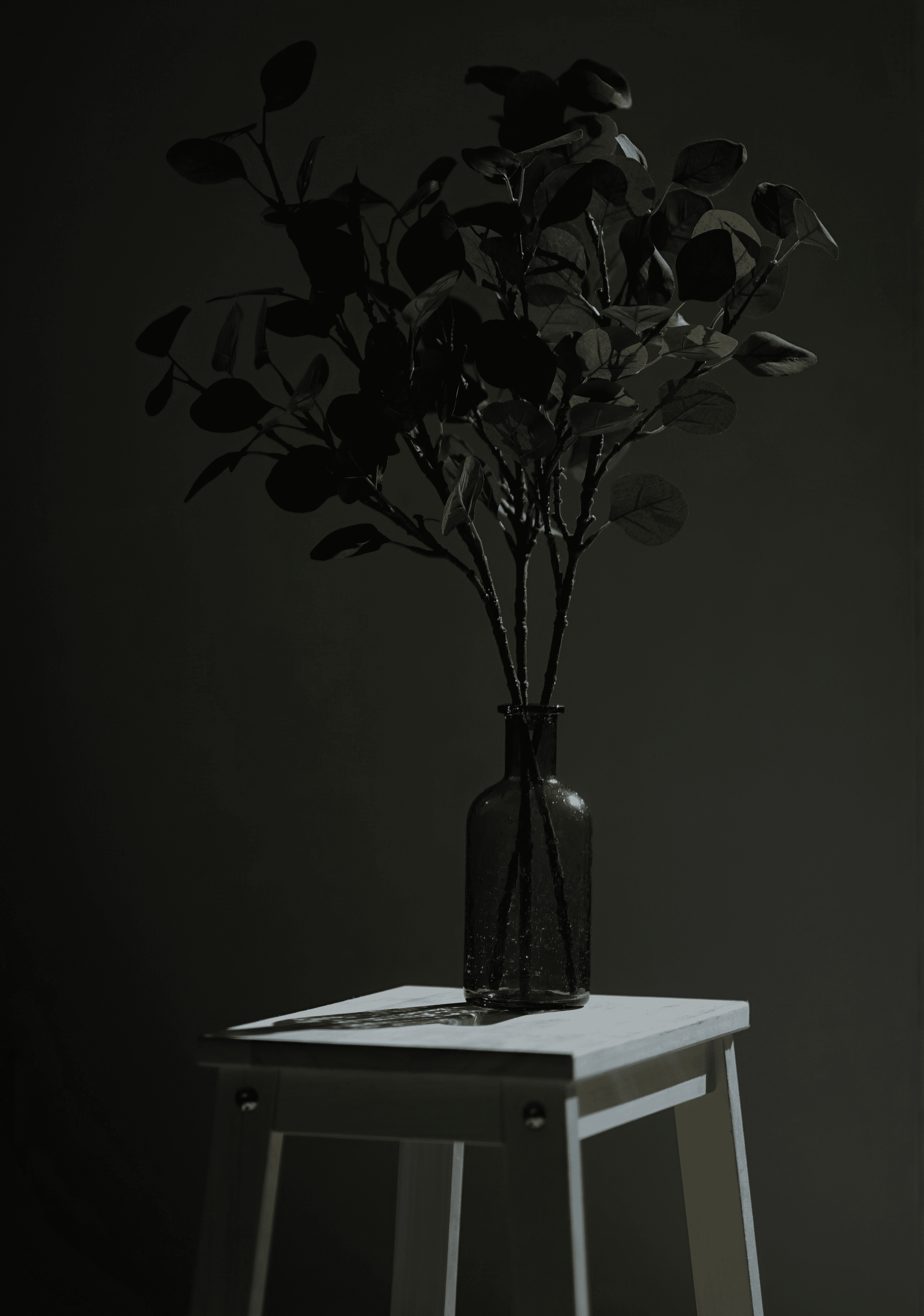 The image features a stylized figure with a unique, abstract design. The main subject appears to be a humanoid form with a wooden texture, wearing a blue robe.