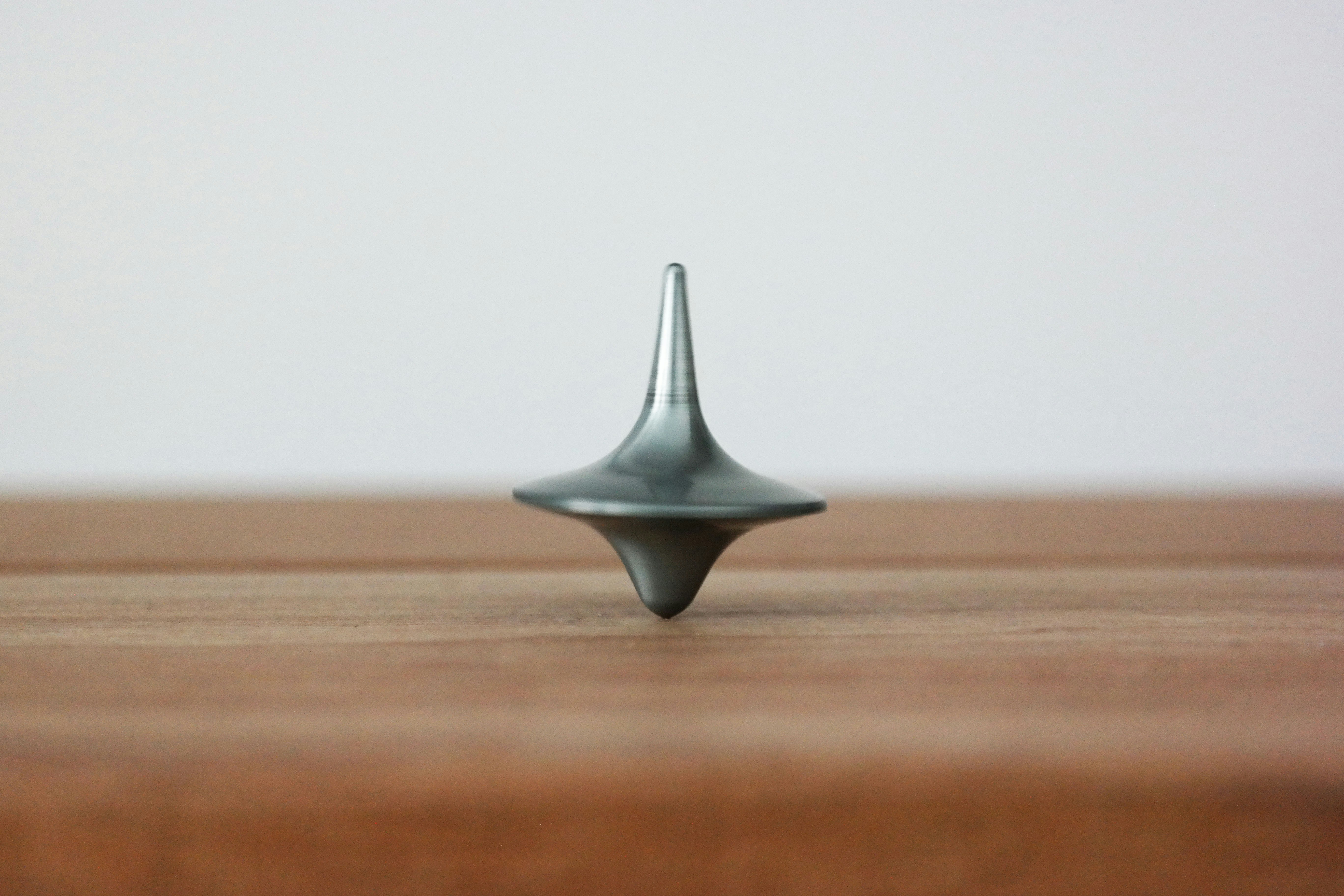 Circle Spinning on a Wooden Table