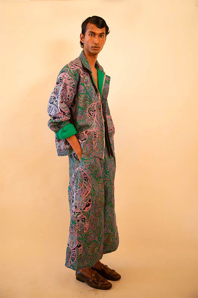 Unisex patchwork bomber and wide-leg pant set made from vintage textiles, featuring dragon motifs, green lining, and two-way zip