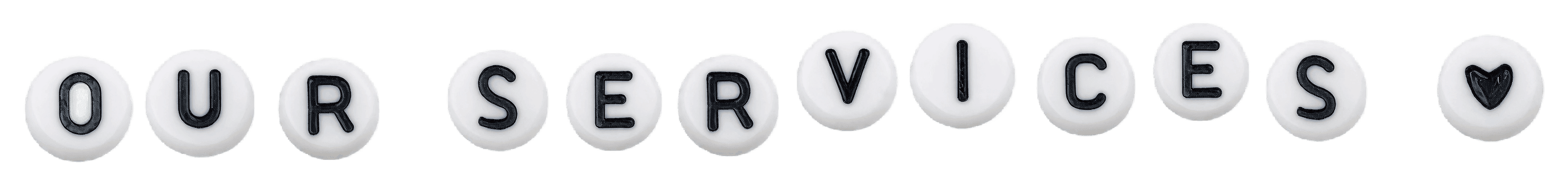 White, round candies each featuring a black letter, spelling the words "OUR SERVICES" with a heart symbol at the end, on a plain background.