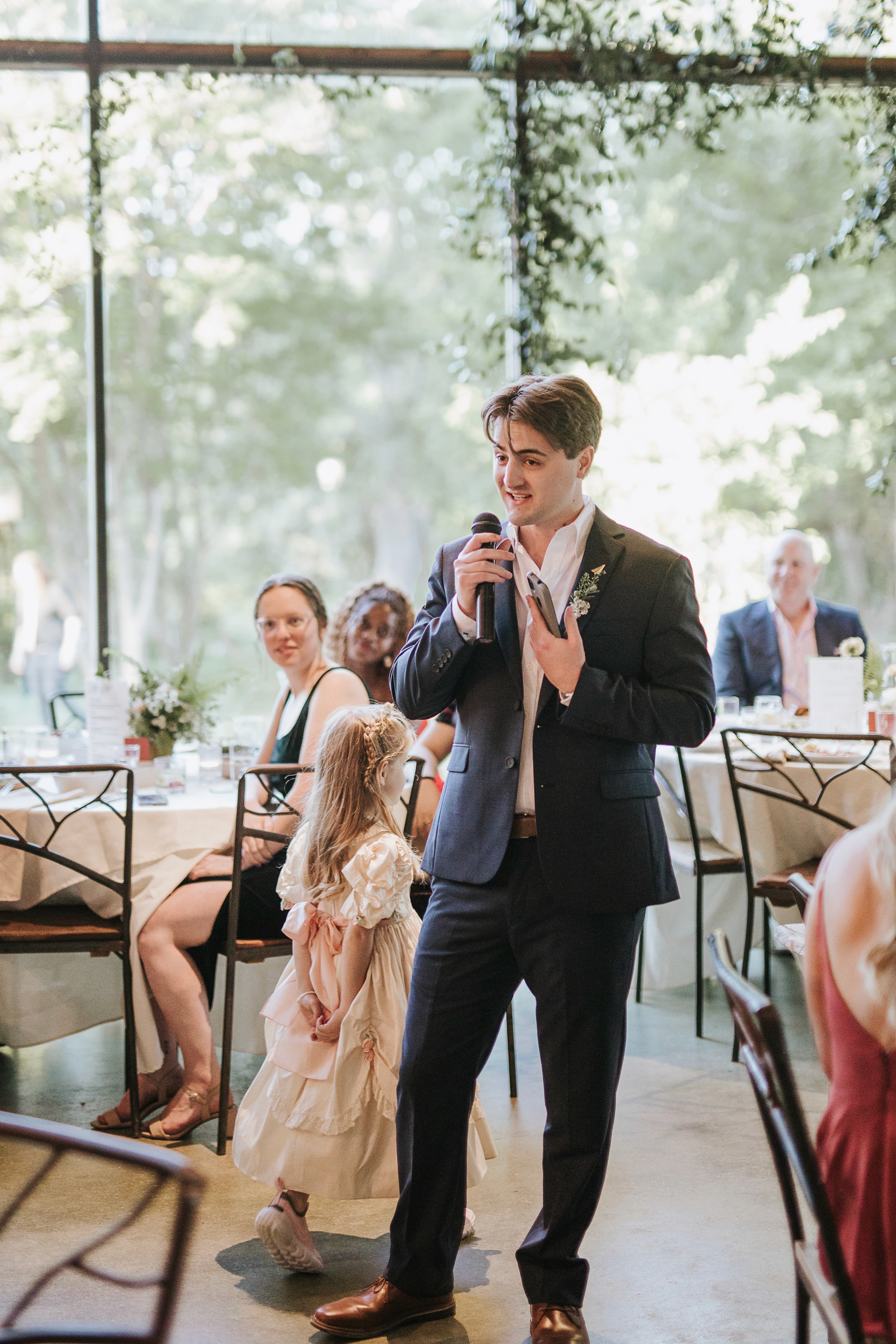 Riding a bicycle with V sign