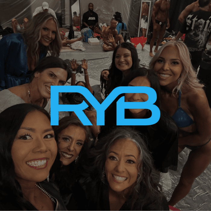 Rachel Stone, personal trainer working out sweaty with a barbell