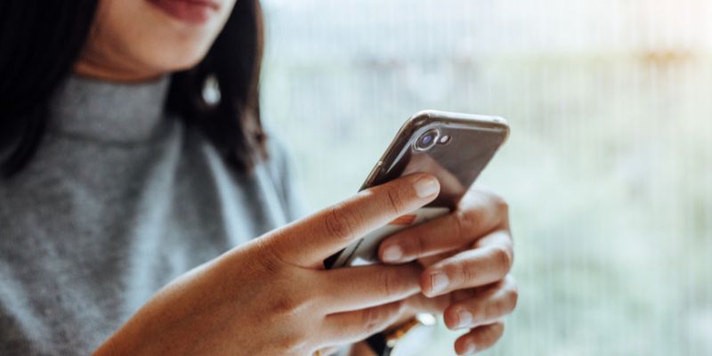 A customer on her phone