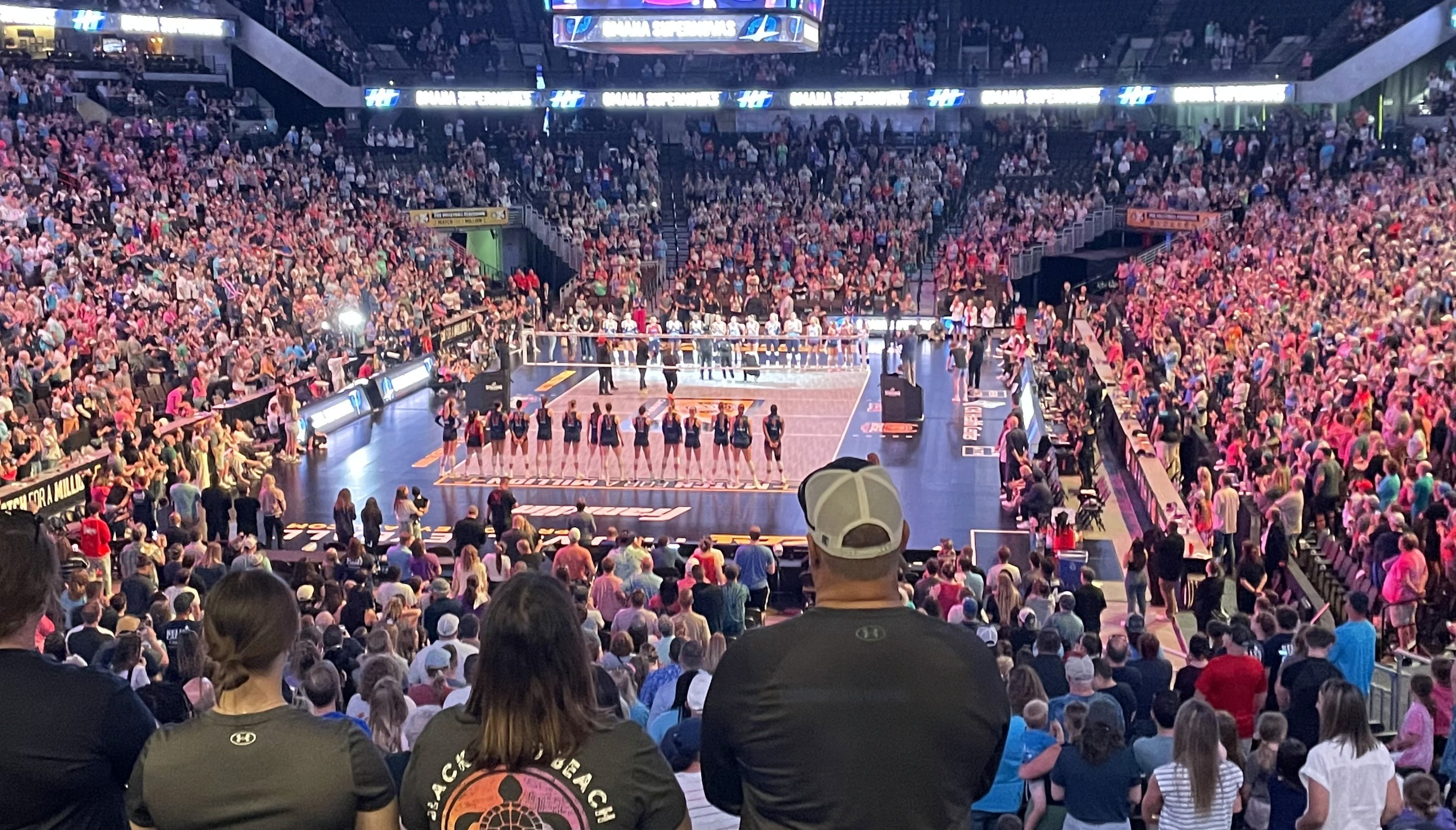 A volleyball court full of fans