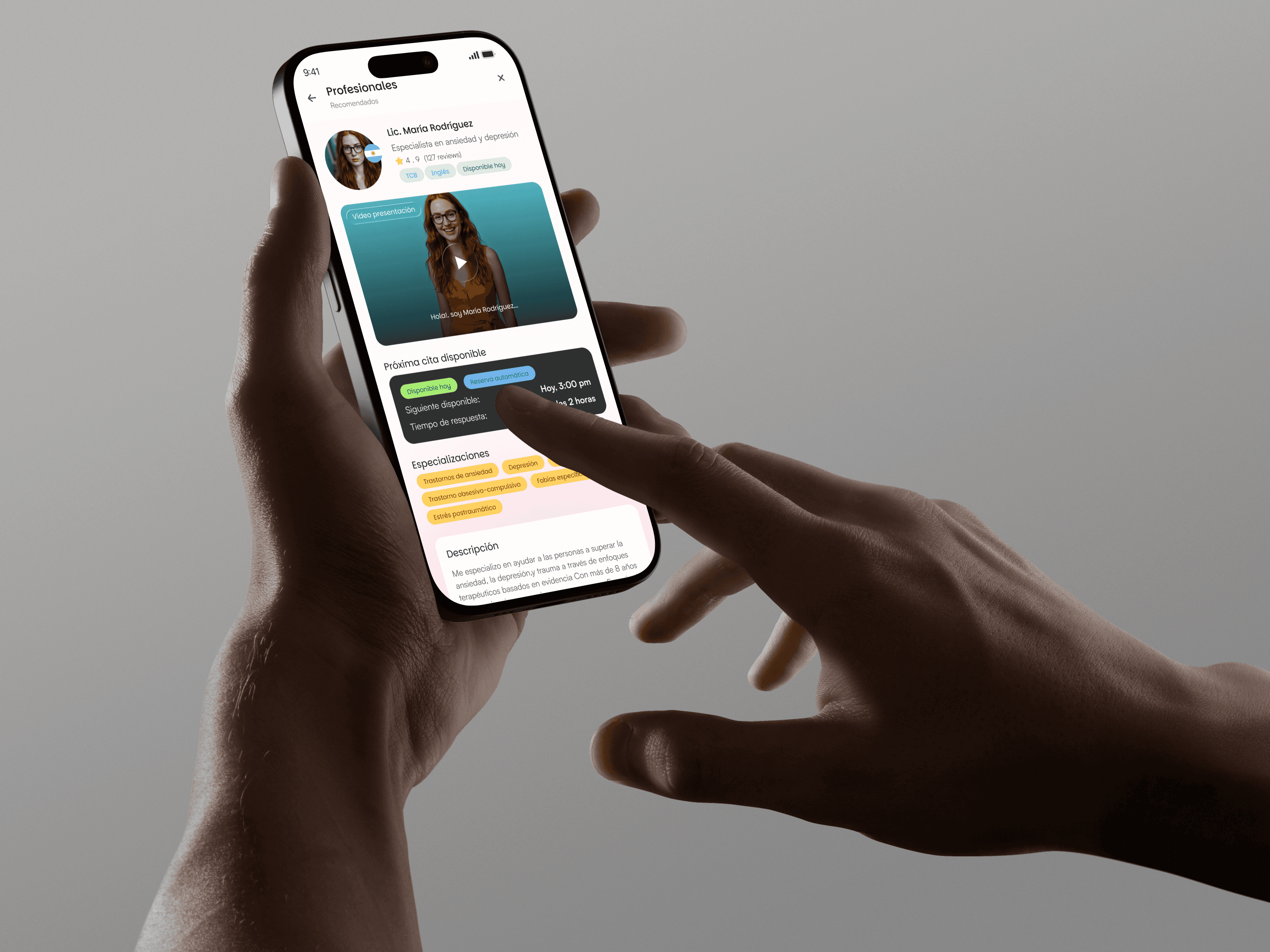 Person sitting in a modern office in front of a wall covered with notes and sketches.