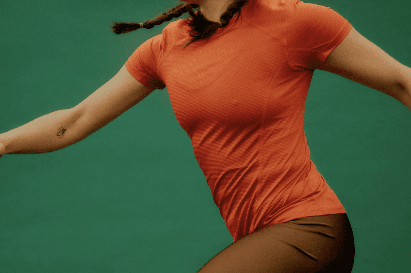 Drone shot of a running track at night