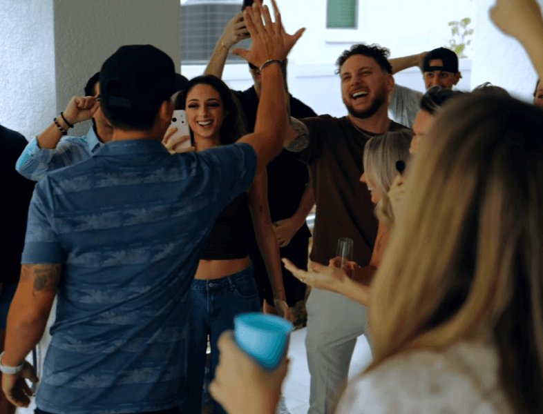 friends and family high-fiving