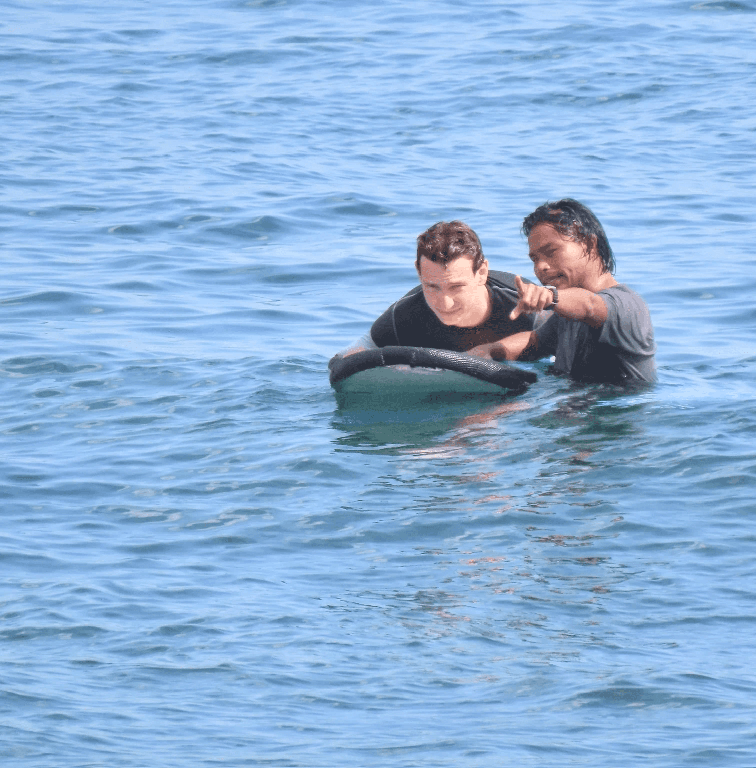 Group of men surfing