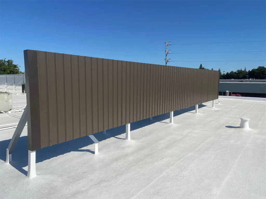 spray foam roofing system with silicone coating and new site screen installation