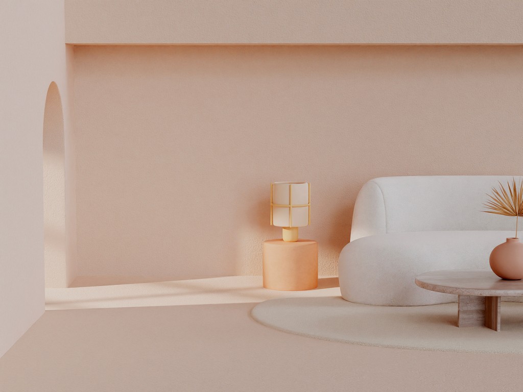 Minimalist beige living room with white sofa, round lamp, and coffee table