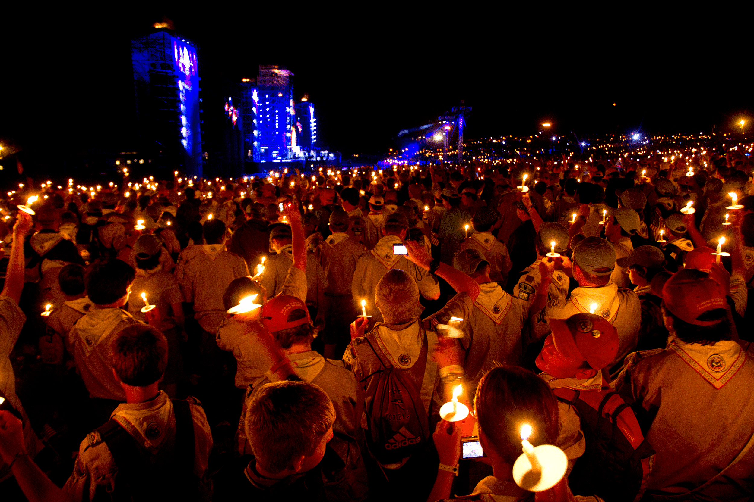 Boy Scouts 100th Anniversary National Scout Jamboree scouts at night with candles