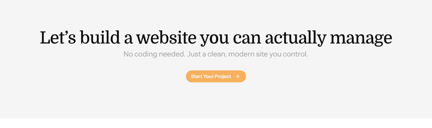 A MacBook with lines of code on its screen on a busy desk