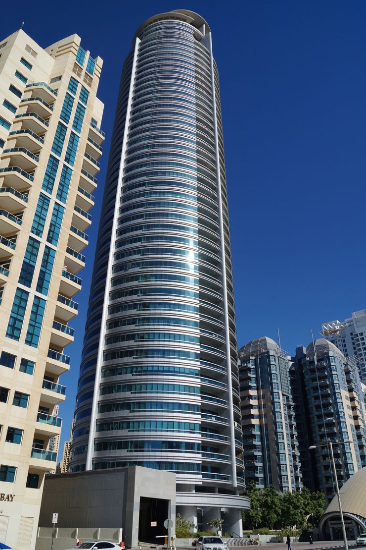 Exterior view of Horizon Tower in Dubai Marina, showcasing luxury apartments for sale by professional agents.