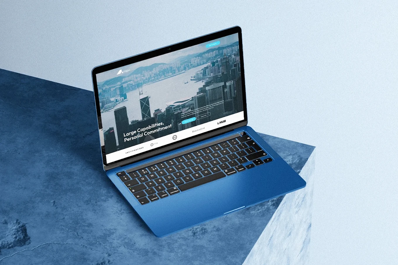 Corporate website displayed on laptop showcasing conversion-focused web design and development