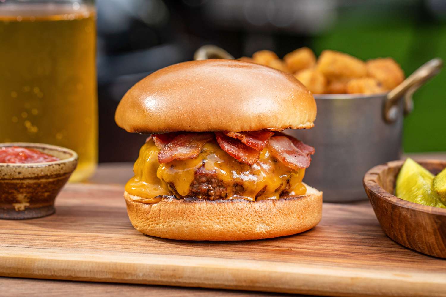 Burger with cheese, bacon, mushrooms, and jalape√±os, typically served on a bun.