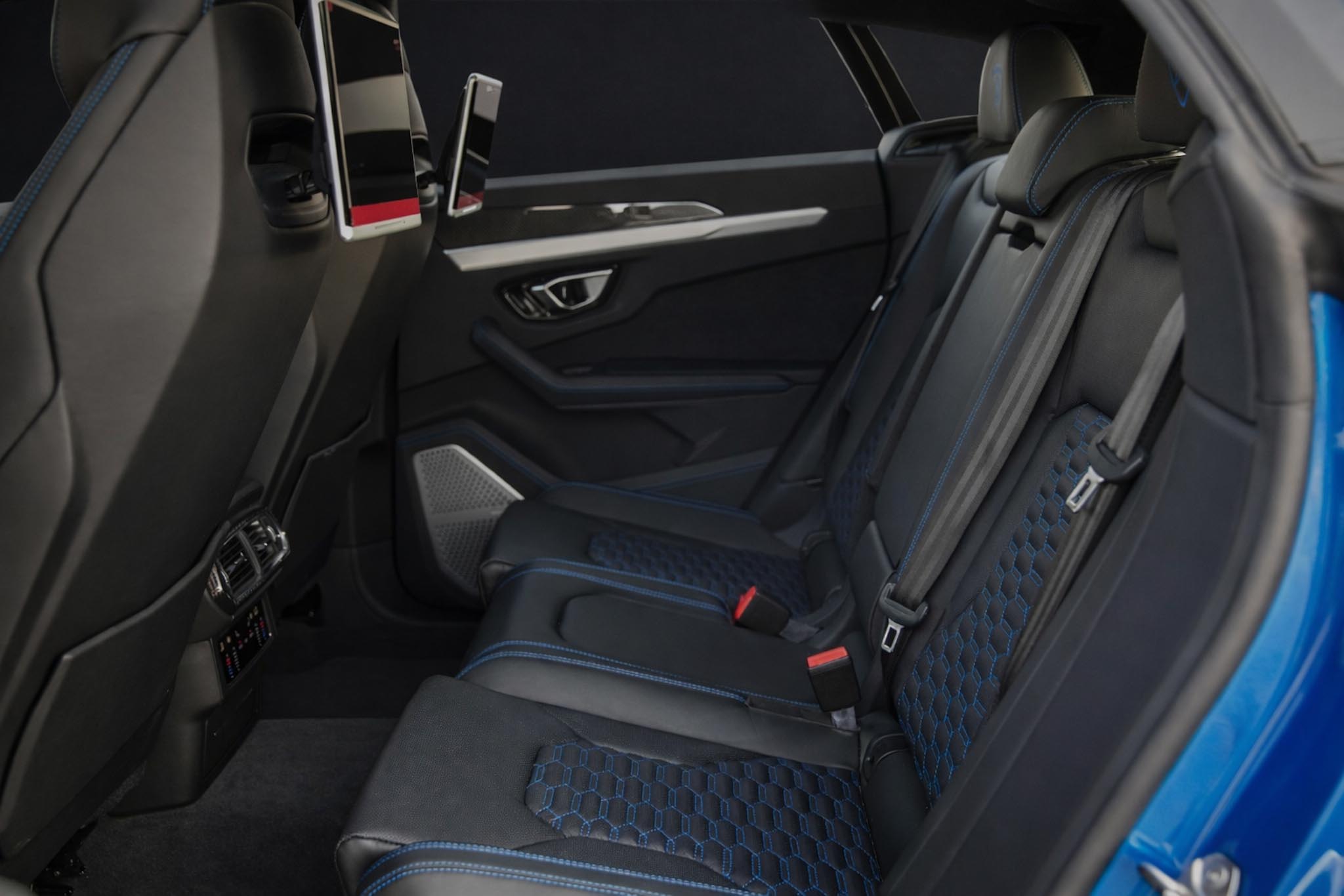 Lamborghini Urus rear seats black interior – luxury SUV comfort Dubai rental Queen of Supercar Rental