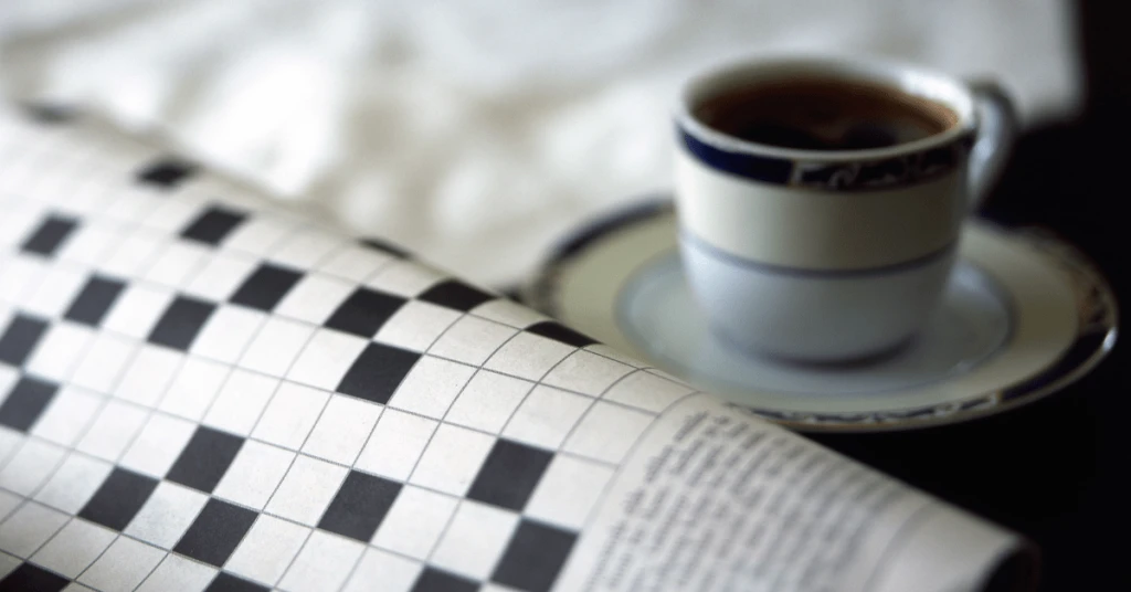 Image of "KHD Homes interior design inspiration with crossword and coffee in a serene home setting"