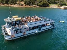 Le Bleu yacht: Aerial, starboard underway crowd headland