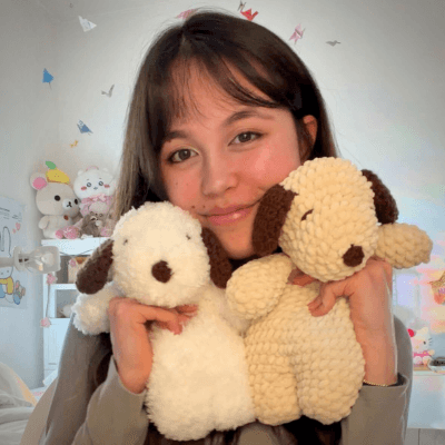 woman holding heft long blonde hair