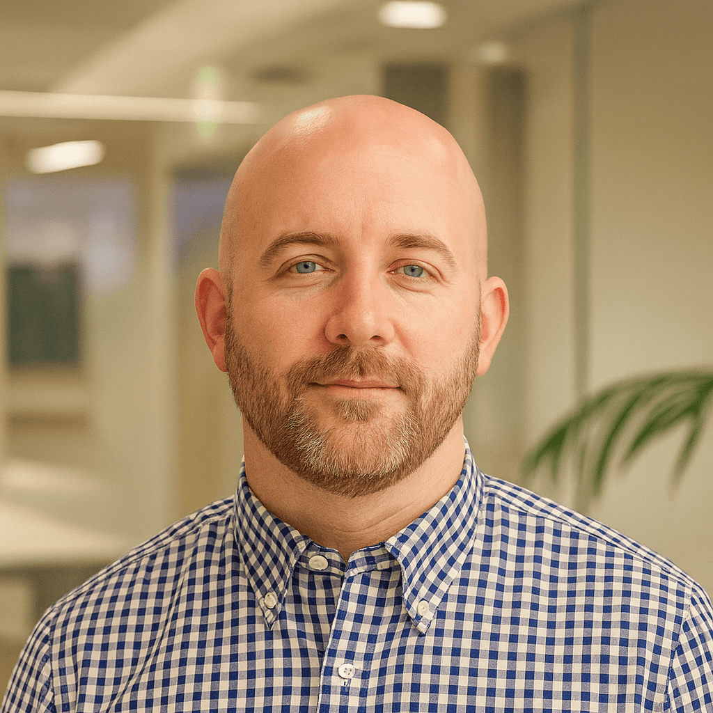 A man in a plaid shirt representing a customer testimonial