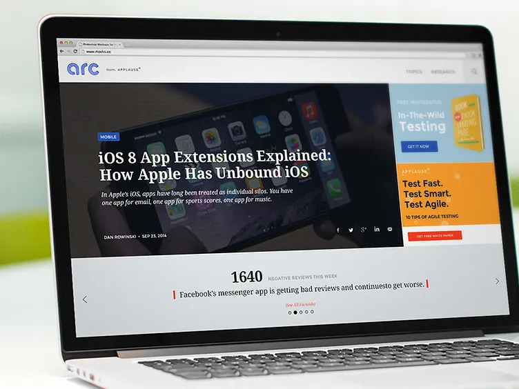 A close-up of a hand wearing multiple decorative rings against a blue background.