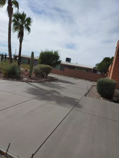 Wide concrete driveway with desert landscaping in Tucson