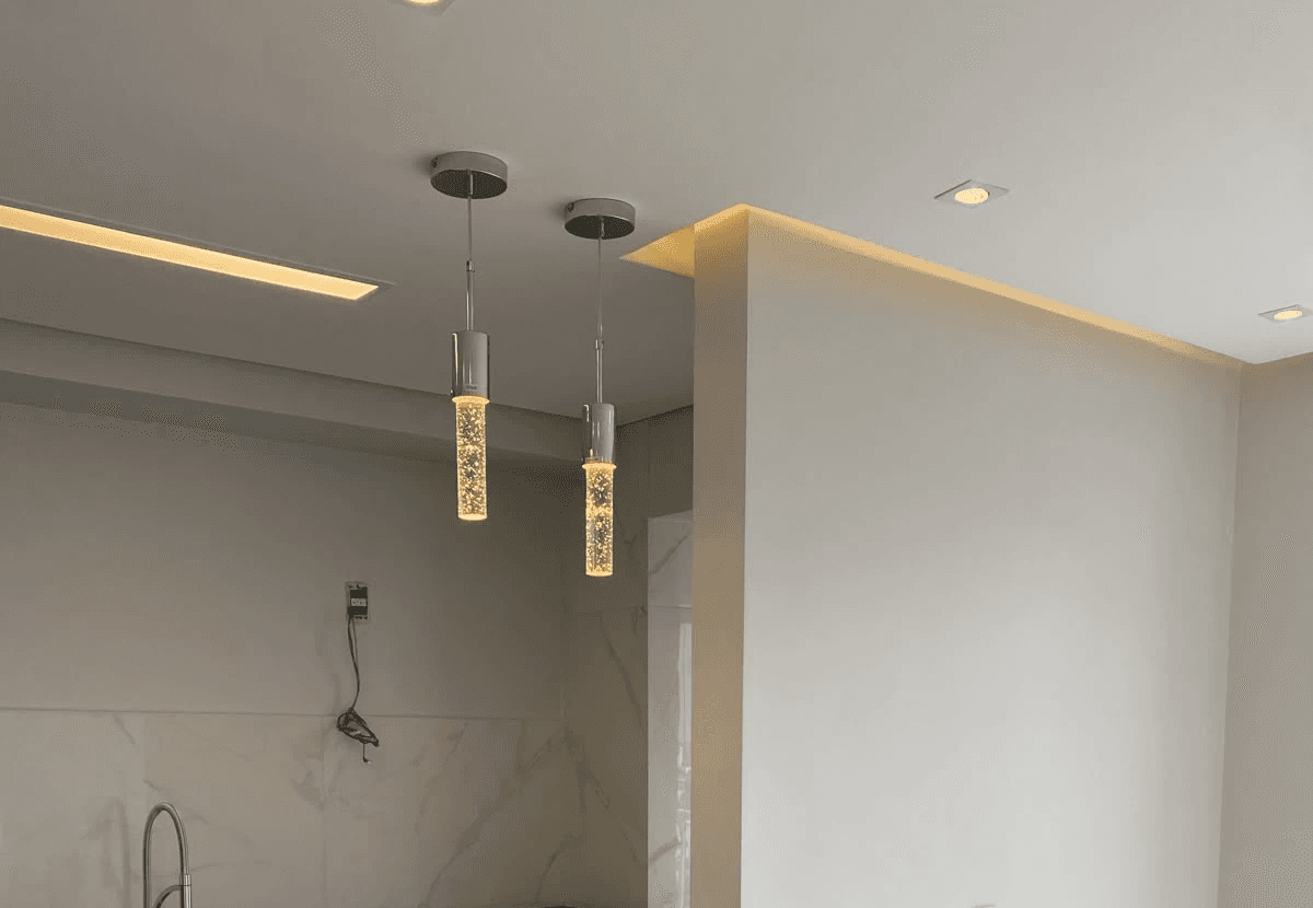white wooden kitchen cabinet and white kitchen counter