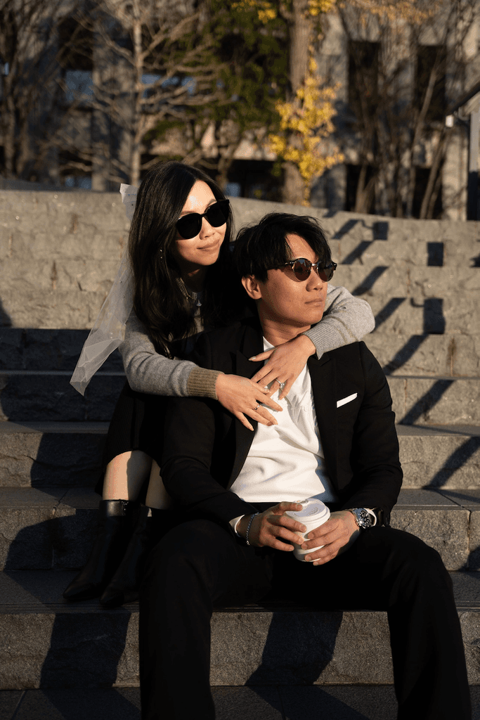 Couple photoshoot posing with sunglasses in Tokyo