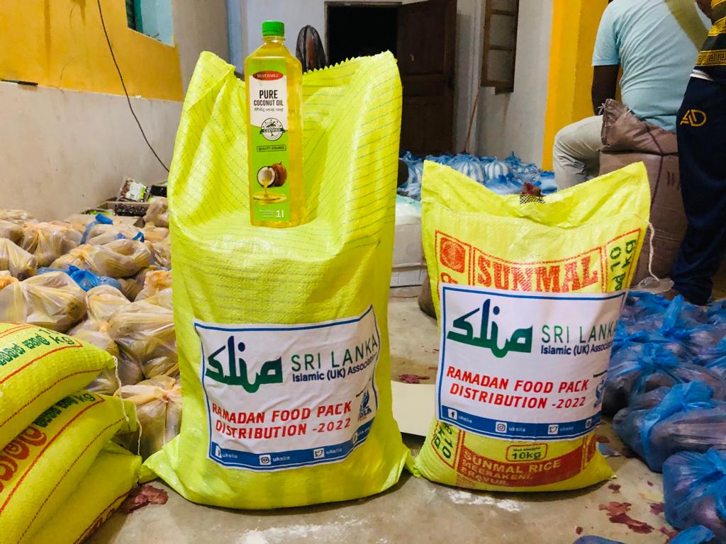 a black and white living room with a large tv