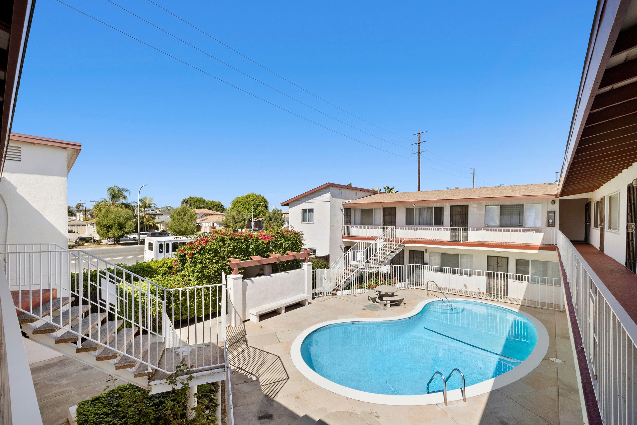 Second-floor view overlooking courtyard pool and unit layout at 11178 Culver Blvd.