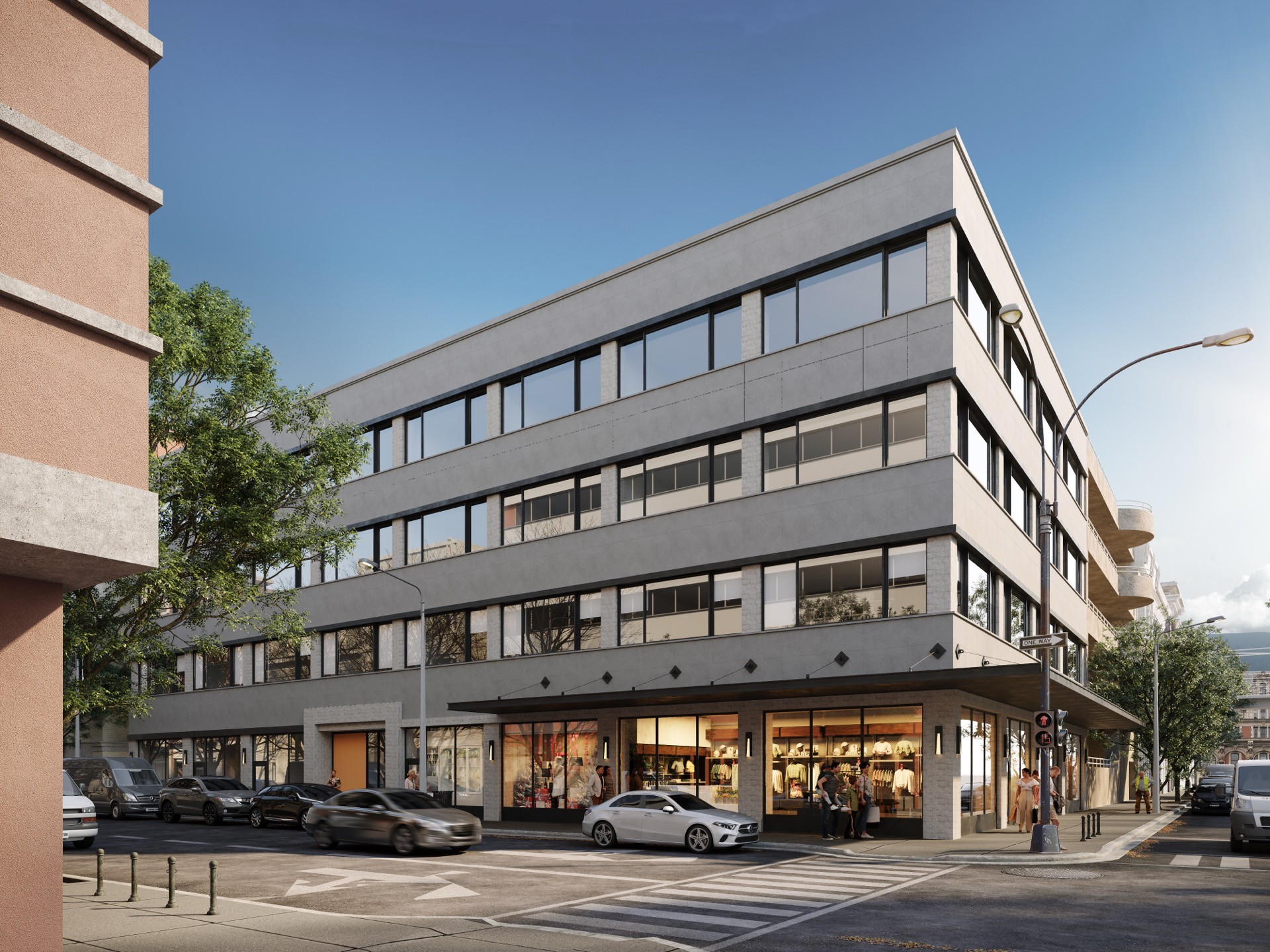 3D exterior rendering of a modern four-story mixed-use building on a city street corner, with a concrete and stone facade, ground-floor retail storefronts, parked cars, and pedestrians under a clear blue sky