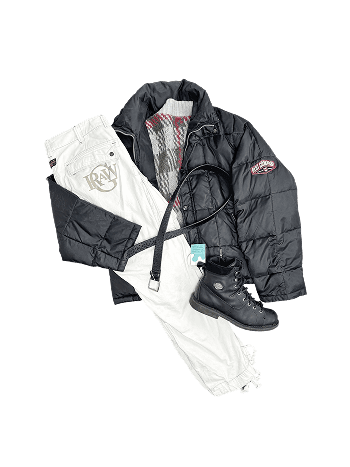 White pants, black puffer jacket, black boots, and a black belt.